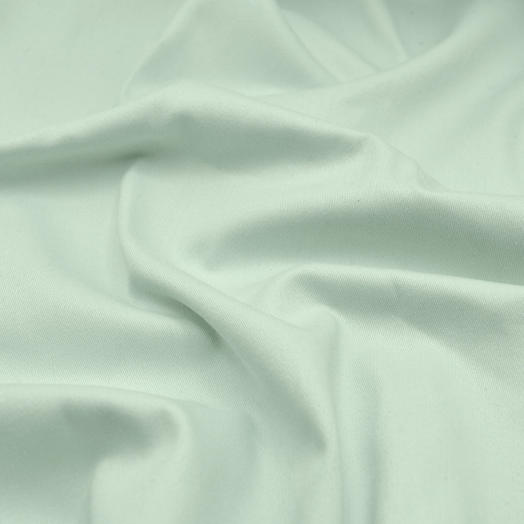 Akustikvorhang psssst 1.300g/m² mintgrün – Stoff-Nahaufnahme schalldämmend